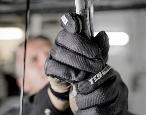 a man holding a pair of scissors in his hands